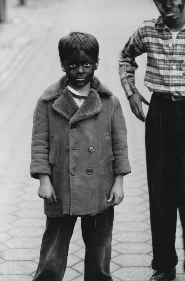 Kid in black-face with friend