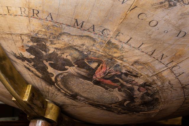 Terra magellanica e cartiglio con storia dell’impresa di Ferdinando Magellano. 